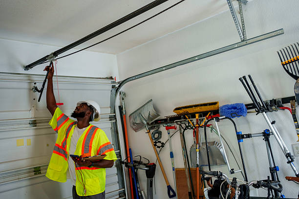 Professional Garage Door Panel Replacement technician working in Candler-McAfee, GA