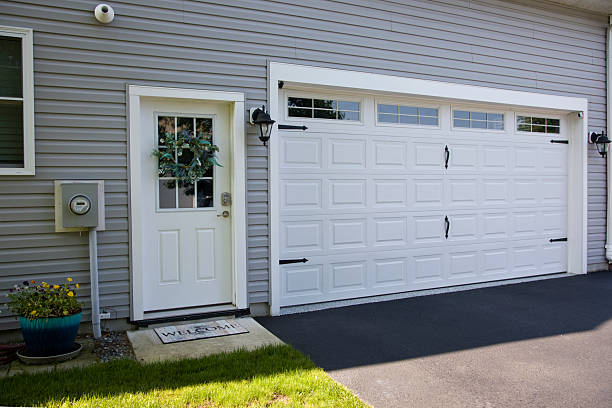 24/7 Emergency Garage Door Panel Replacement experts in Candler-McAfee, GA